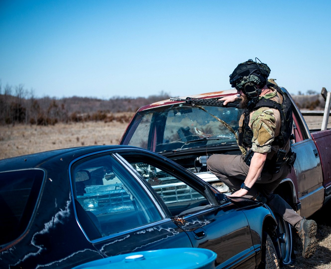 Competitor shooting from a vehicle hood at The Burial Mound